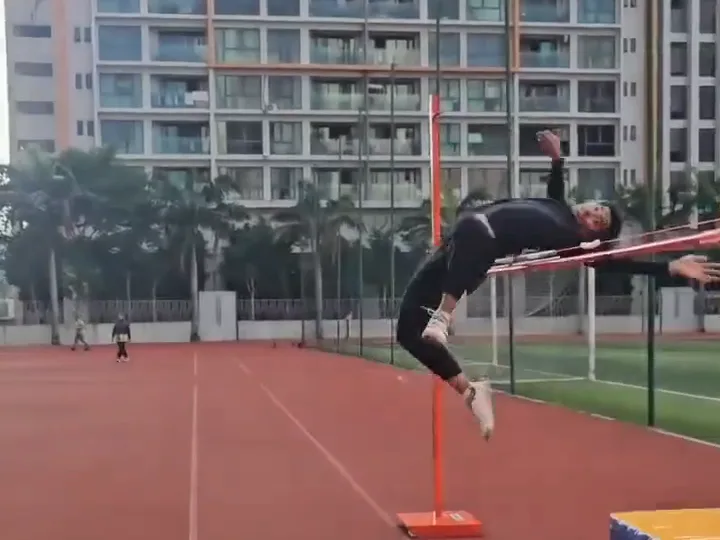 A club athlete arched over the bar in the high jump